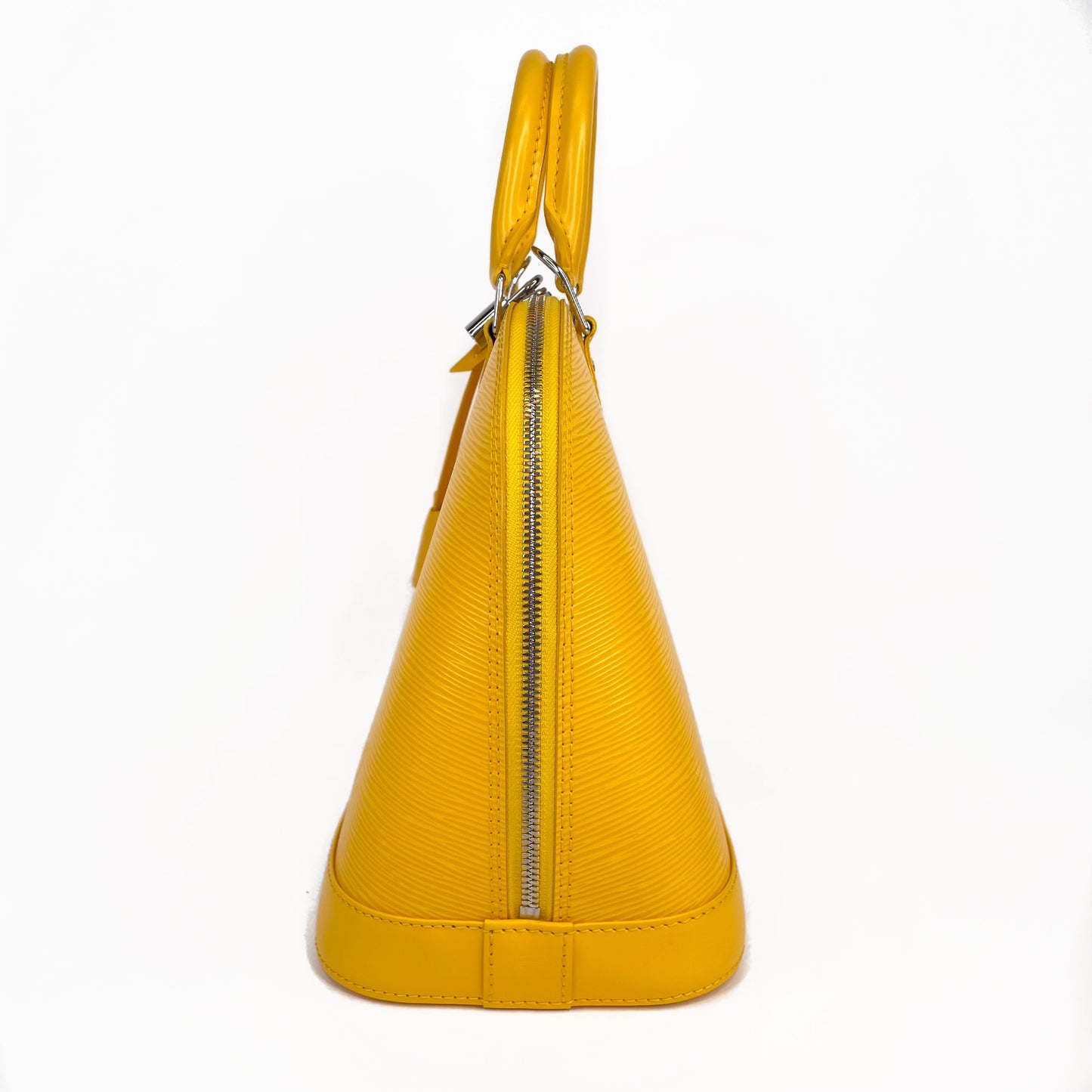 LOUIS VUITTON Yellow Alma PM Satchel