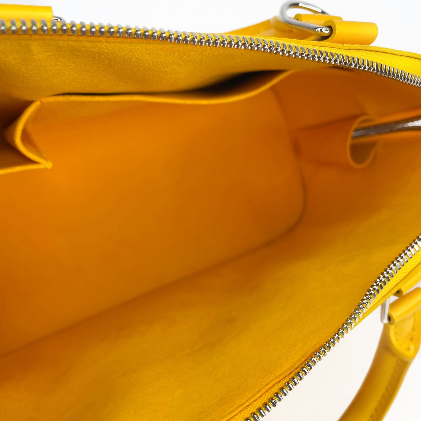 LOUIS VUITTON Yellow Alma PM Satchel