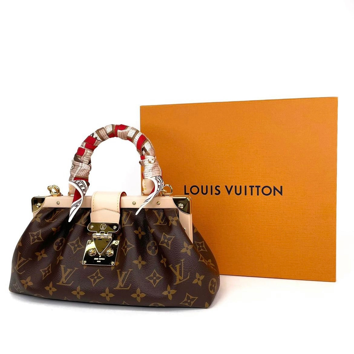 Louis Vuitton Clutch Monogram