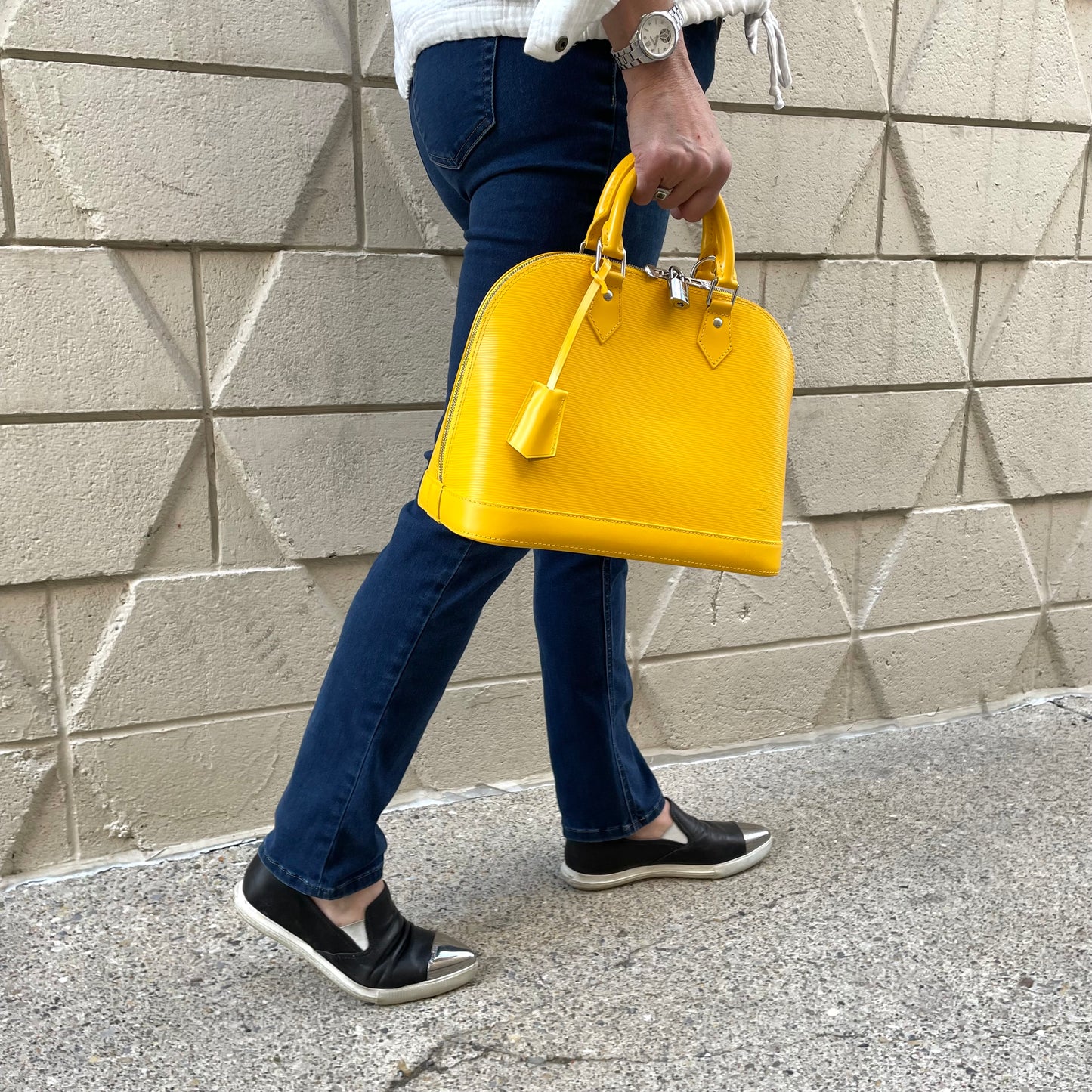 LOUIS VUITTON Yellow Alma PM Satchel