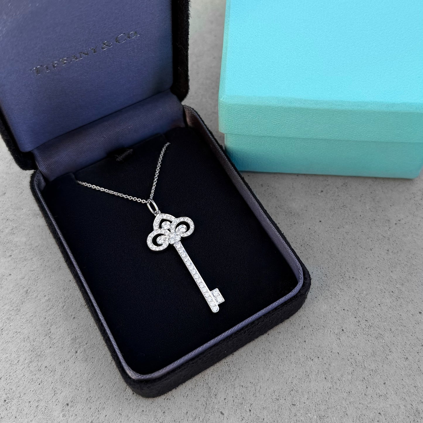 Tiffany & Co. Fleur de Lis Platinum Key Pendant Necklace