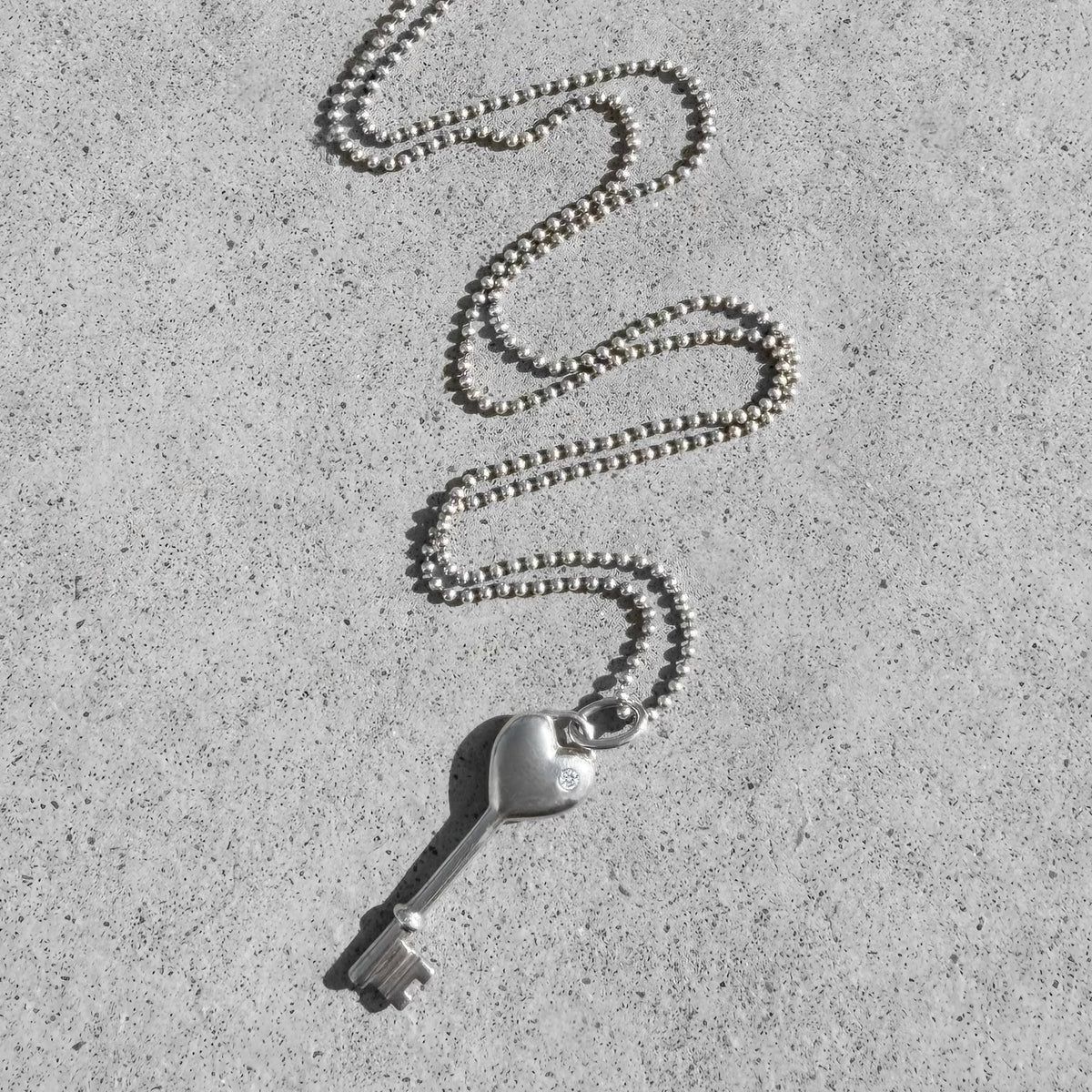 Tiffany & Co. Sterling Silver Heart Key Pendant Necklace