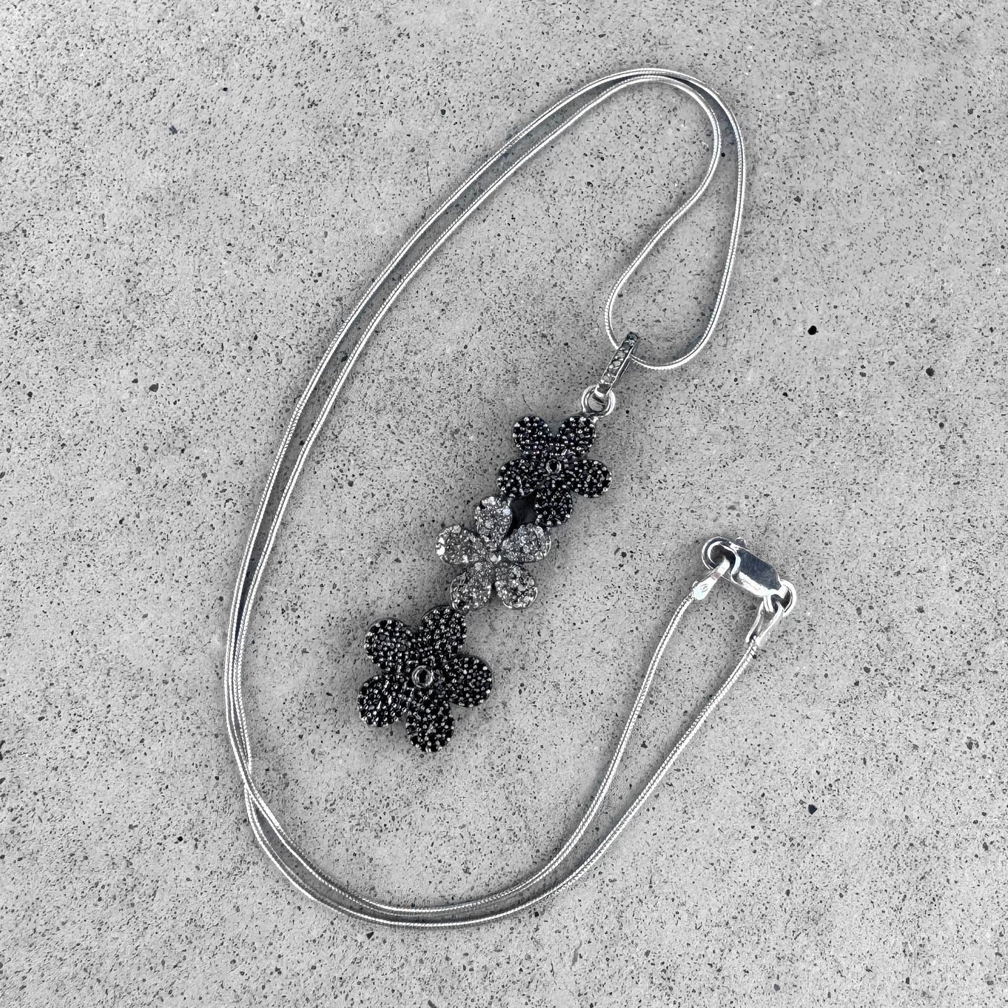 Black Spinel and Diamonds Rhodium Plated Sterling Silver Floral Pendant on Chain