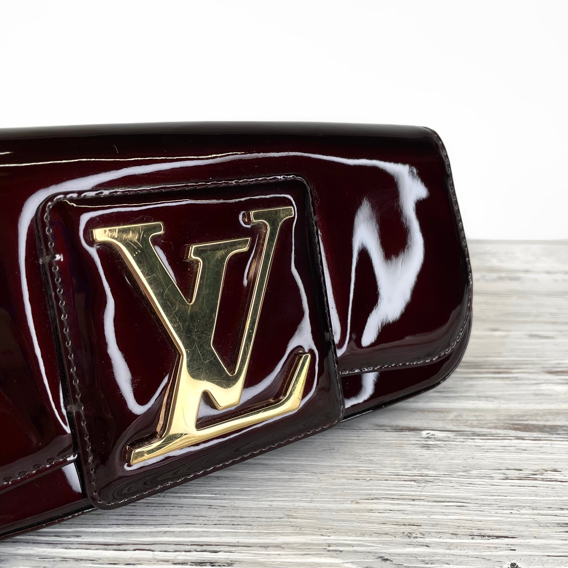 LOUIS VUITTON Amarante Vernis Glossy Patent Calf Leather SoBe Clutch –  Wilder's Consignment House
